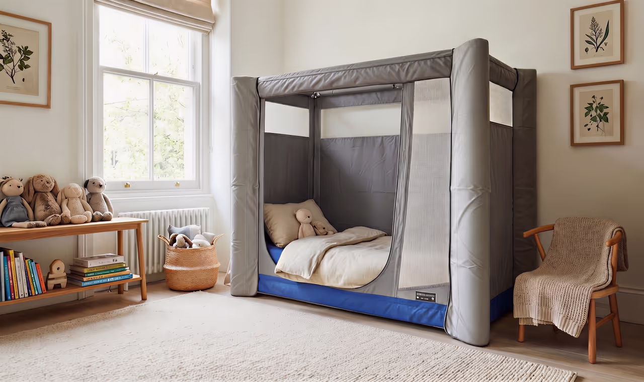 A Creative Care Safe and Sound safe space bed set up in a calming bedroom